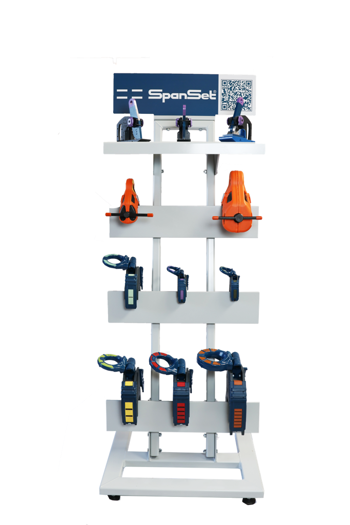 Free-standing display rack with lifting clamps and load restraint products